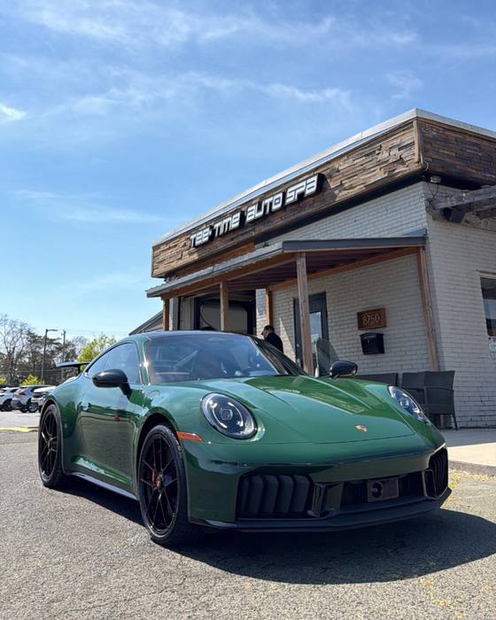 Green Porsche 911 at the shop